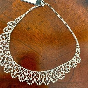 Fancy crystal and non-tarnishing silver necklace.